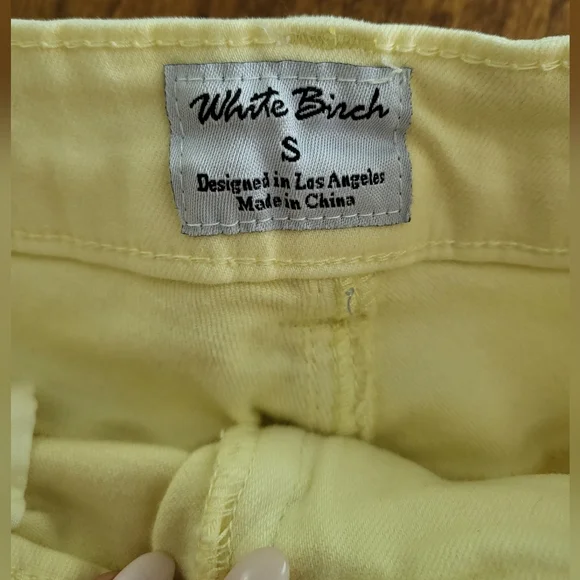 Mid-rise Yellow Distressed Shorts - Picture 8 of 10